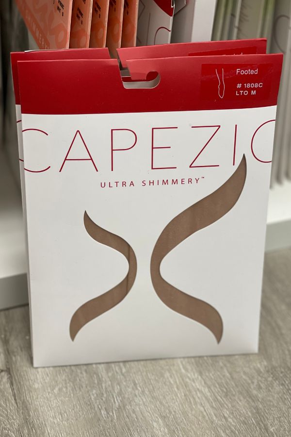 Capezio Children's Ultra Shimmery Footed Tights in Light Toast 1808C at The Dance Shop Long Island